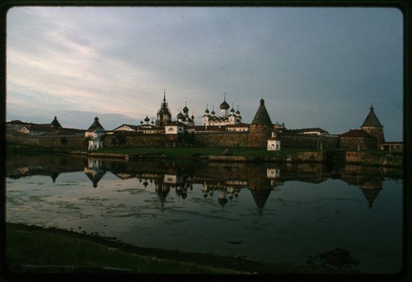 Monastery of the Transfiguration of the Savior (16th-19th centuries), southwest view across Bay of Felicity, evening, after storm, Solovetskii Island, Russia; 1999