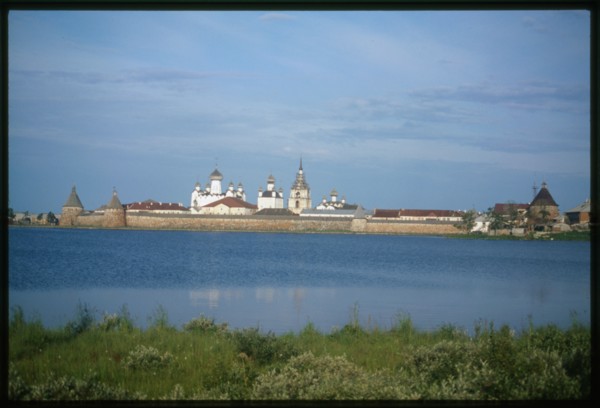 Monastery of the Transfiguration of the Savior (16th-19th centuries), northeast view across Holy Lake, with White Tower (left), Arkhangelsk Tower, and St. Nicholas Tower (right), Solovetskii Island, R...