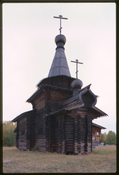 Log Church of the Savior from the village of Zashiversk (1700), southeast view, moved and reassembled in the Outdoor Architecture and History Museum at Akademgorodok, Russia; 1999