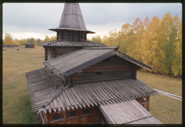 Log Church of the Savior from the village of Zashiversk (1700), west view from bell tower, moved and reassembled in the Outdoor Architecture and History Museum at Akademgorodok, Russia 1999.