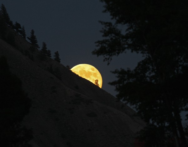 Moon rise over Mt. Everts near Mammoth Hot Springs in Yellowstone National Park; Date: 3 July 2012