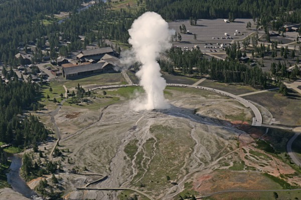 Aerial view of Old Faithful Geyser and Old Faithful Lodge in Yellowstone National Park; Date: 22 June 2006