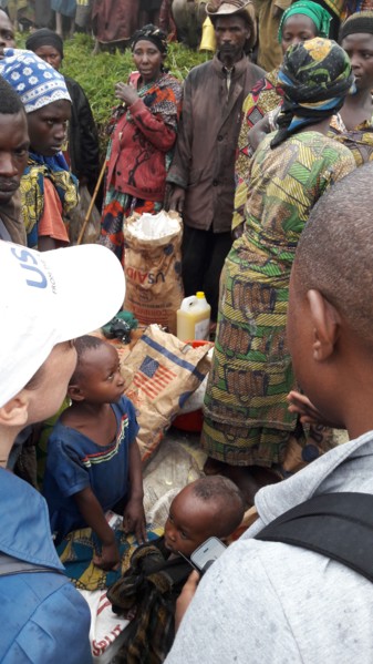 A relief worker and those in need in North Kivu Cote d’Ivoire (Ivory Coast) ca. 23 March 2017