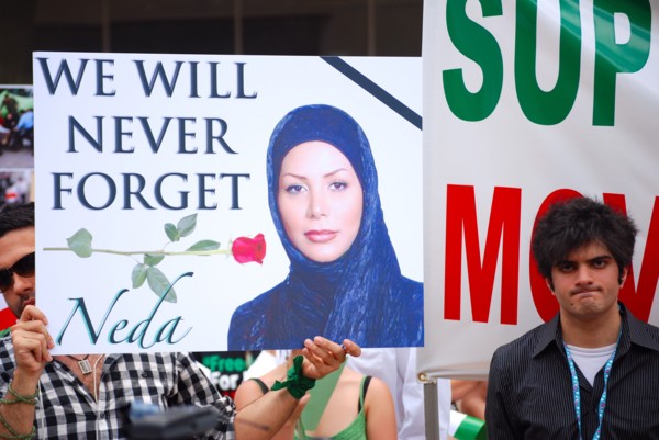 Iranians in Texas taking part in a Freedom for Iran / Green Revolution rally at Dallas City Hall plaza in downtown Dallas, TX ca. June 2009