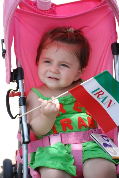 Iranians in Texas taking part in a Freedom for Iran / Green Revolution rally at Dallas City Hall plaza in downtown Dallas, TX ca. June 2009