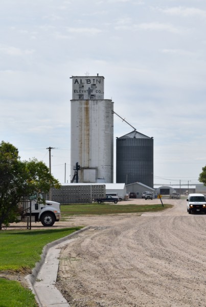 Grain elevator in the small town of Albin, Wyoming (cattle hauler trailer in the foreground)