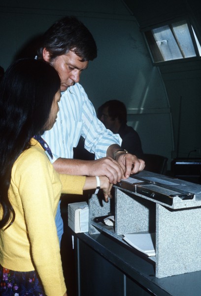 A Vietnamese refugee is fingerprinted