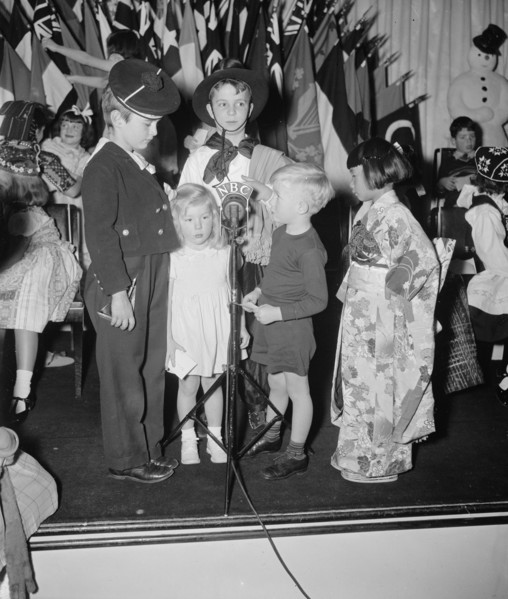 Diplomatic children broadcast Xmas greeting. Washington