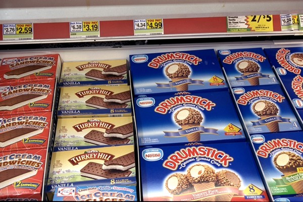 Ice Cream In Freezer Section Of Supermarket