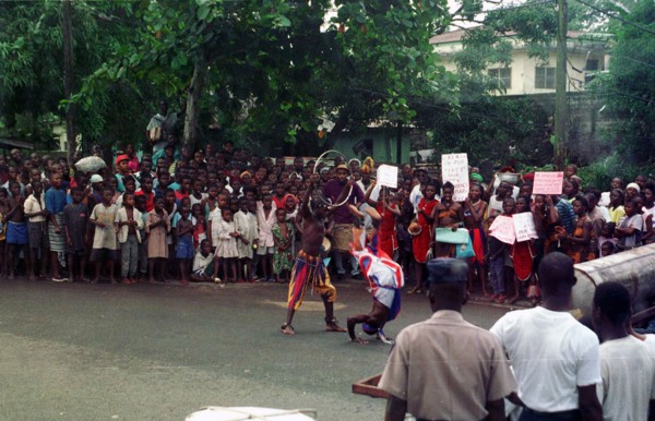 Liberian locals dance in the streets