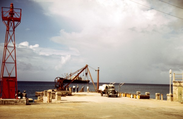 Loading cargo on a freighter in the harbor of Frederiksted