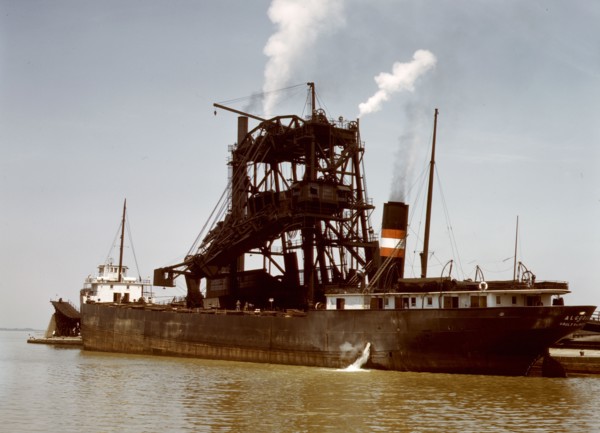 Loading coal into a freighter at one of the Pennsylvania Railroad docks