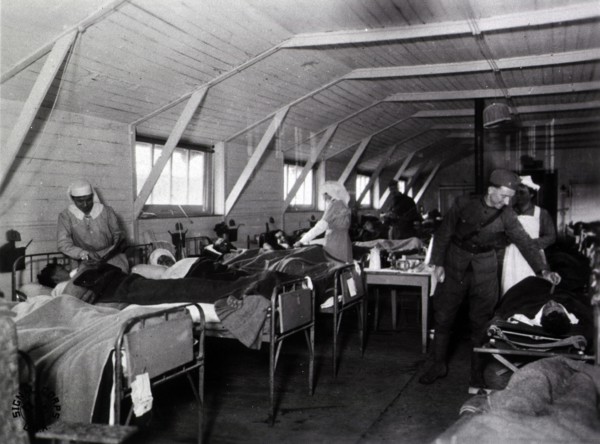 Nurses attending to African American patients