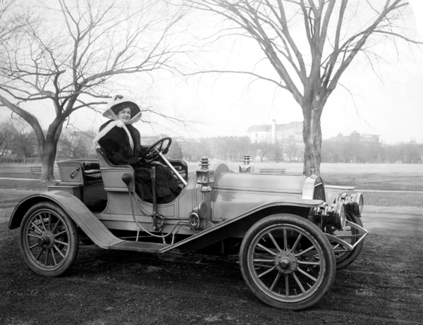 Woman driving a car ca. 1905