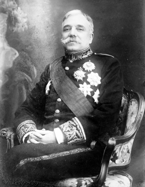 Campos Henriques, Minister of Justice, Portugal, seated, in uniform