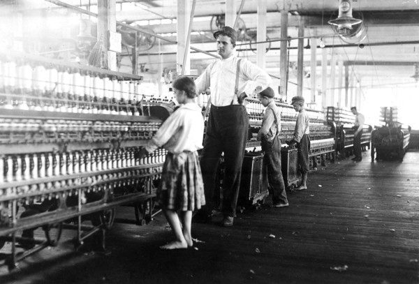 A young spinner in Yazoo City Yarn Mills. Said she was 13, but doubtful, May 1911