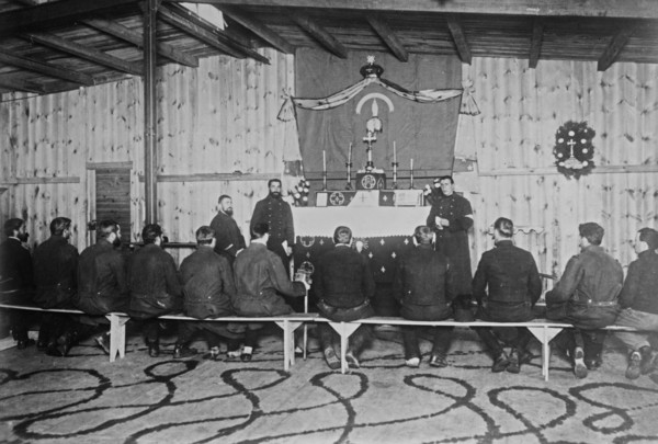 Russian prisoners seated in a chapel during services at Zossen prisoner of war camp, Wünsdorf, Zossen, Germany, during World War I ca. 1915