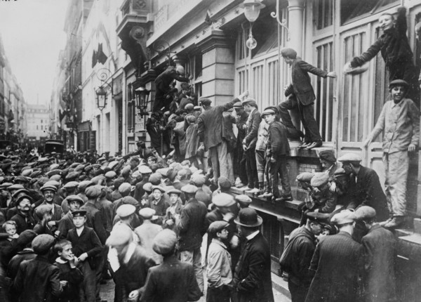 Newsboys waiting for news during the beginning of World War I, Paris, France ca. 1914-1915