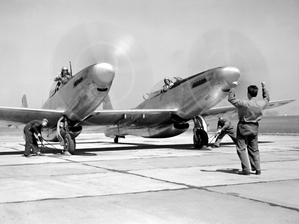 Pilot William Swann, right cockpit, prepares the North American XF-82 Twin Mustang for flight at the National Advisory Committee for Aeronautics (NACA) Lewis Flight Propulsion Laboratory.