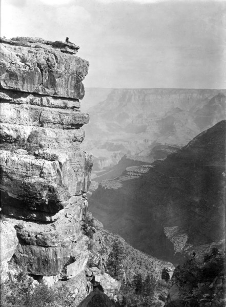 Ca. early 1900s - Man relaxing on edge of Grand Canyon
