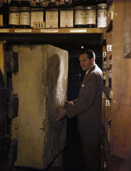 1948 - man entering a wine cellar at a night club in new york city