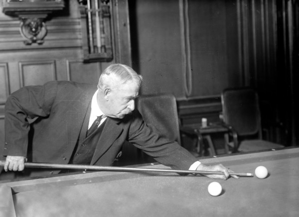 Photo shows Edward W. Gardner playing billiards, possibly at championship game with Edouard Roudil, reported in New York Times, Feb. 18, 1912.