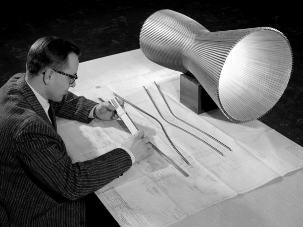 NASA Engineer Examines the Design of a Regeneratively-Cooled Rocket Engine ca. 1958