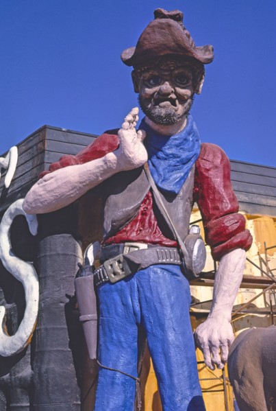 1980s United States -  Spray Trucks foam, prospector statue detail, Frontage Road I-5, Albany, Oregon 1987
