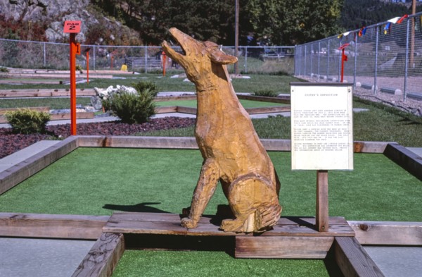 1980s America -  Golden West mini golf, coyote, straight on, Hill City, South Dakota 1987