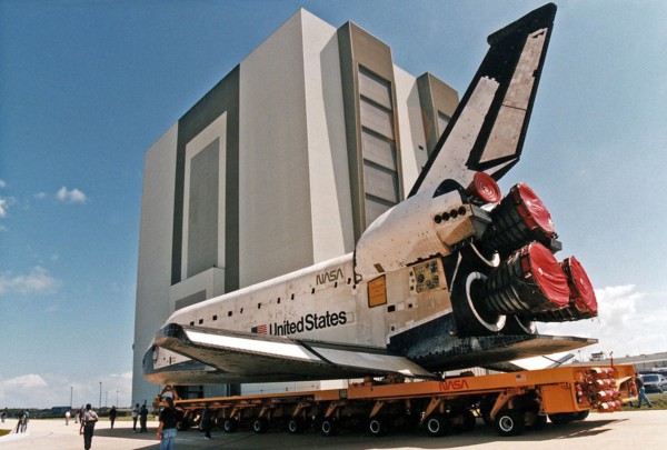 Space Shuttle Columbia rolls over from Orbiter Processing Facility bay 1 to the Vehicle Assembly Building to be mated to its external tank/solid rocket booster stack ca. 1997