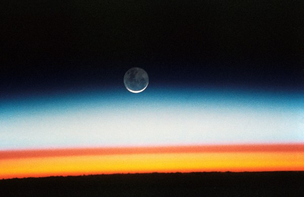 (22 Oct.-1 Nov. 1992) --- As the Space Shuttle Columbia orbited Earth in an easterly direction over the Indian Ocean, moonrise was followed quickly by sunrise.