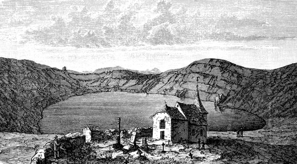 Vineyards and church at a Maar in the Eifel