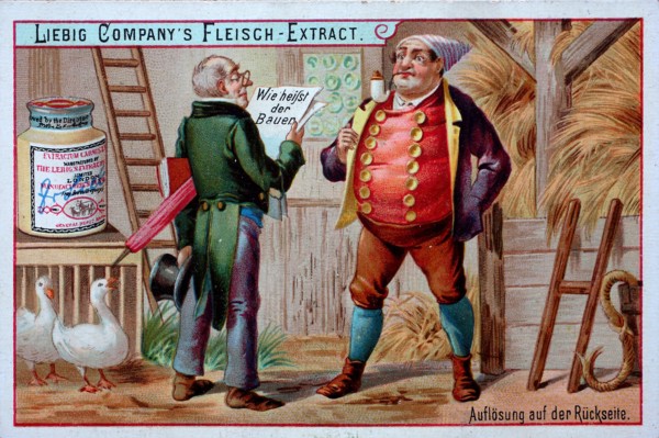 Official stands in front of a farmer in the barn