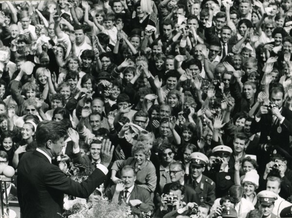 President John F. Kennedy exchanges greetings with the crowd