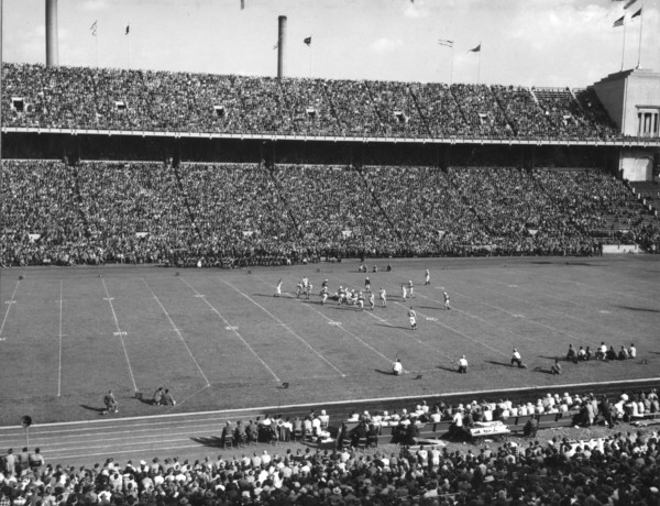 Sixty-three thousand football fans attended the annual game between Ohio State University and the University of Iowa. Columbus, Ohio, 1948.