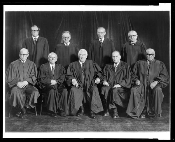 U.S. Supreme Court group portrait, 1976. Group portrait of Justices William J. Brennan, Jr.; Byron R. White; Harry A. Blackmun; William H. Rehnquist; Potter Stewart; Thurgood Marshall; Lewis F. Powell...