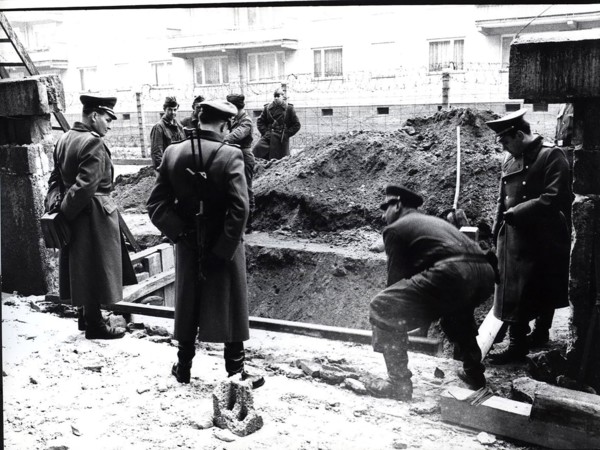 Because of A Water Line Burst Directly Under The Wall a Troup of Volksarmy Workers Are Called In.