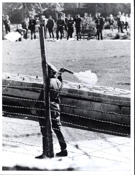 October 1961 - Communist 'People's Policemen' (Volkspolizist), Standing Between the Border Fence