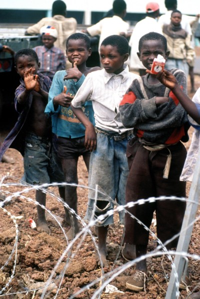 1994 - Children in Goma Zaire watch as supplies are unloaded.