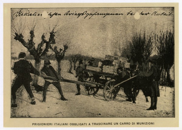 Italian prisoners forced to drag an ammunition wagon