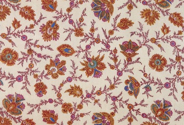 Paisley influenced floral pattern repeat on off white field.