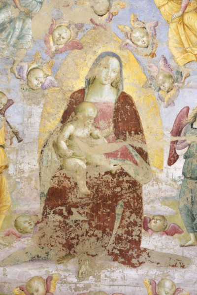 Panicale (Italy, Umbria, province of Perugia), Church of San Sebastiano. Madonna and Child, Musician Angels and Saints Augustine and Mary Magdalene, attribution to Raffaello Sanzio, fresco, around 150...