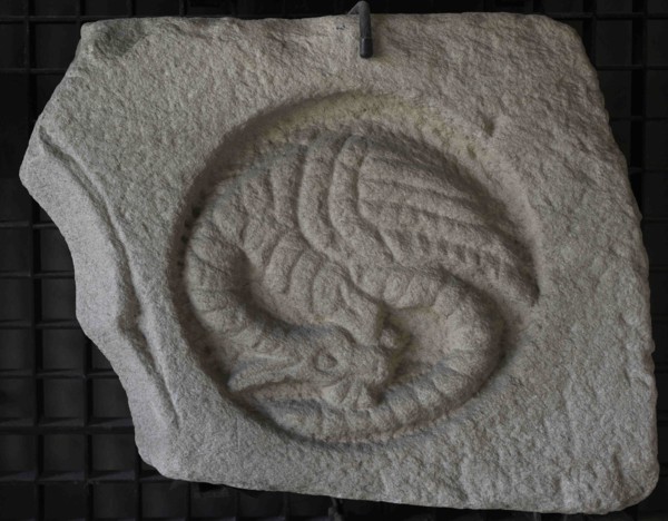 Voussoir with a relief depicting a dragon