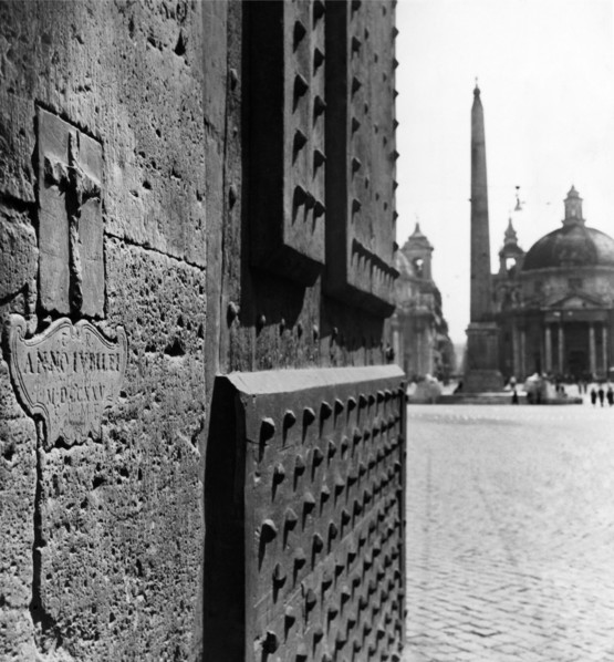Rome. Porta del Popolo with the plaque of the jubilee 1725. 1950