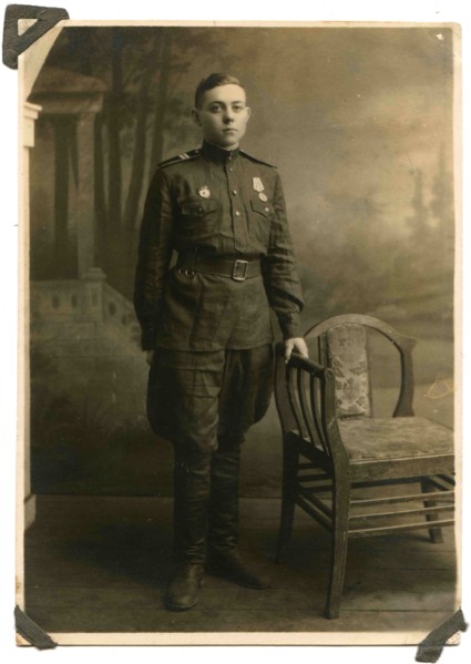 Soviet Army sergeant with a medal For the Victory in Great Patriotic War and the sign Guard on his chest.