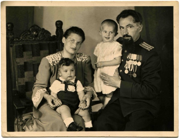 Cabinet photo of the family of colonel of the Soviet Army, awarded orders and medals.