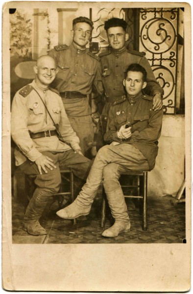 Four smiling officers of the Red Army.