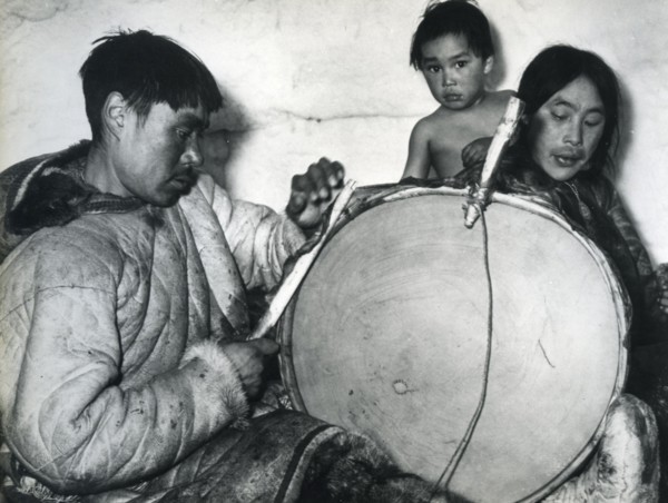 Eskimos cut the seal skin