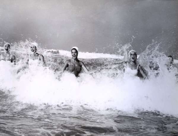 Girls playing with waves, miami, usa, 1959