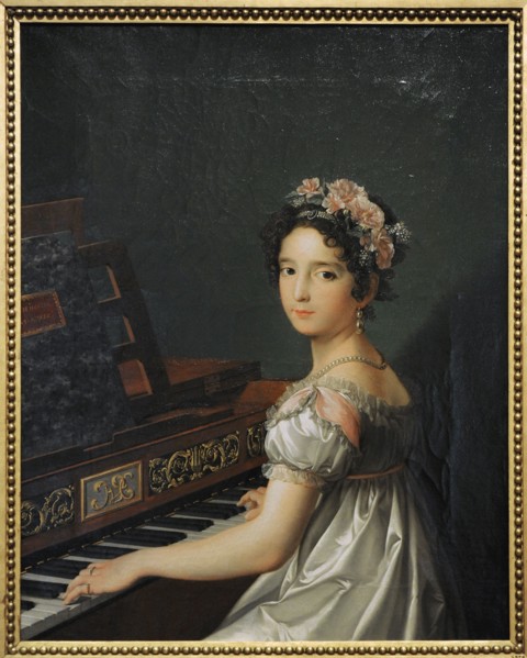 Manuela Gonzalez Velazquez playing the piano.